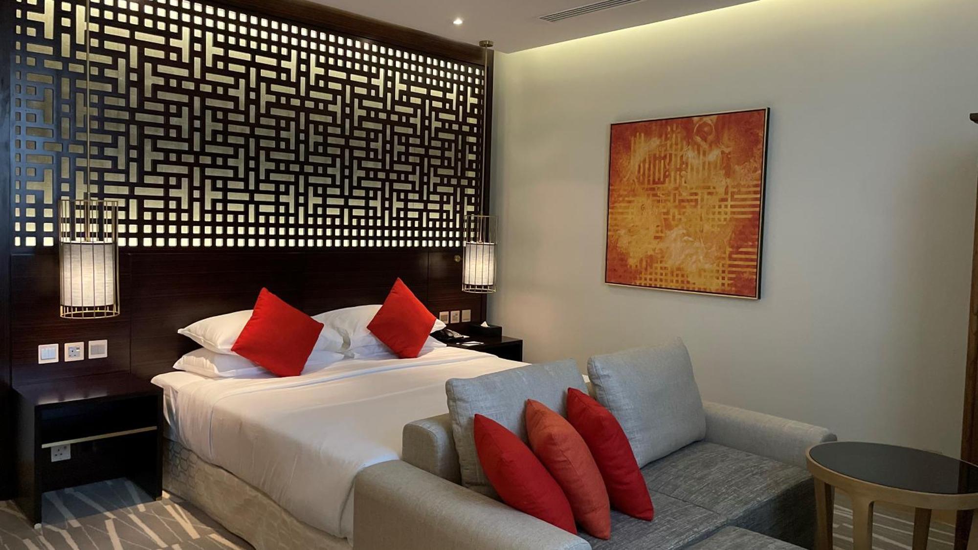 Ramada Hotel & Suites By Wyndham Al Qassim Al Bukayriah Exterior photo A bedroom at the hotel