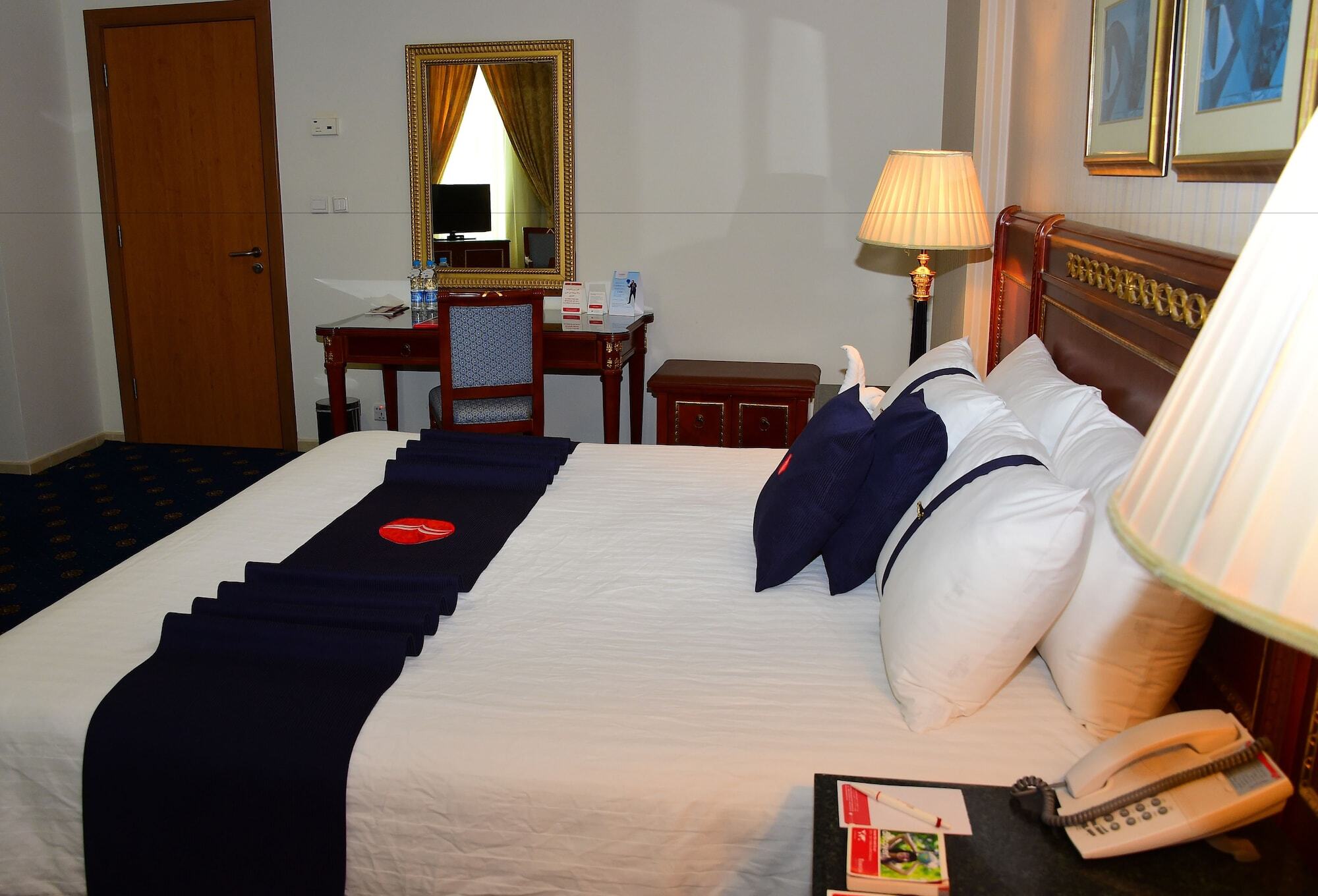 Ramada Hotel & Suites By Wyndham Al Qassim Al Bukayriah Exterior photo A bedroom at the hotel