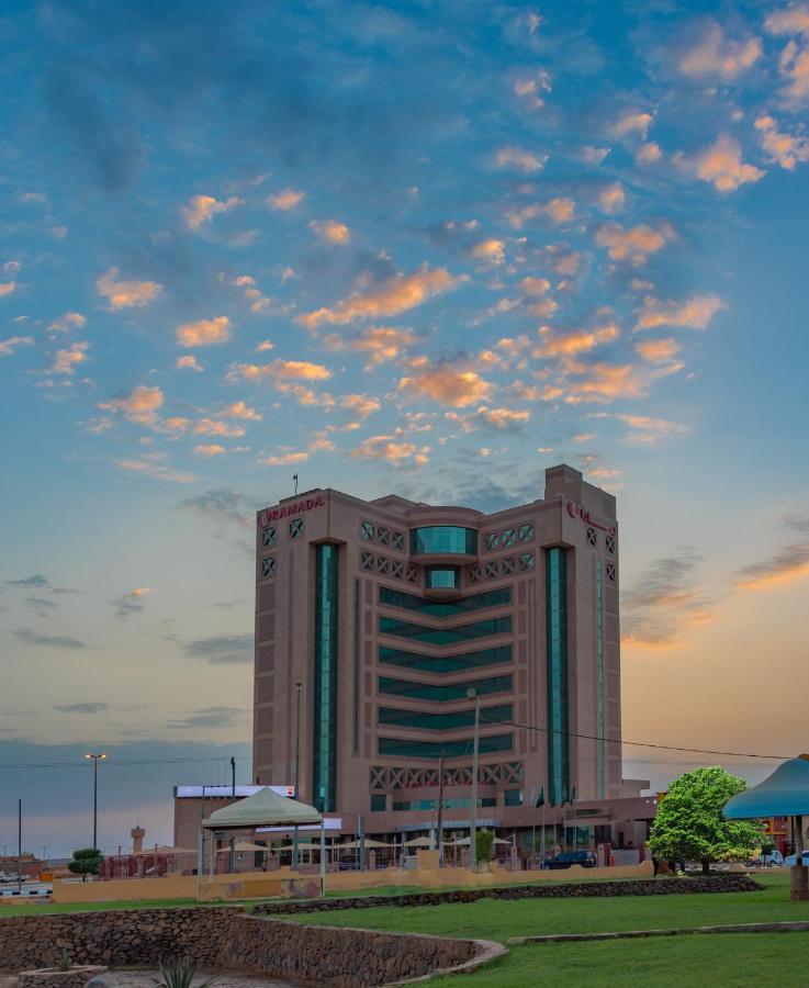 Ramada Hotel & Suites By Wyndham Al Qassim Al Bukayriah Exterior photo The hotel at sunset